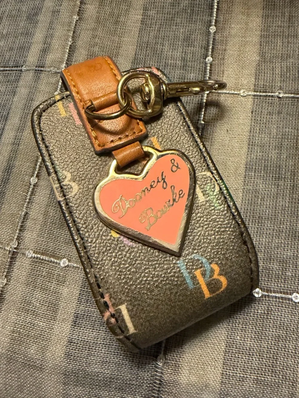 Dooney & Bourke Black Multicolor DB Cellphone Case Hand sanitizer/Lotion Holder